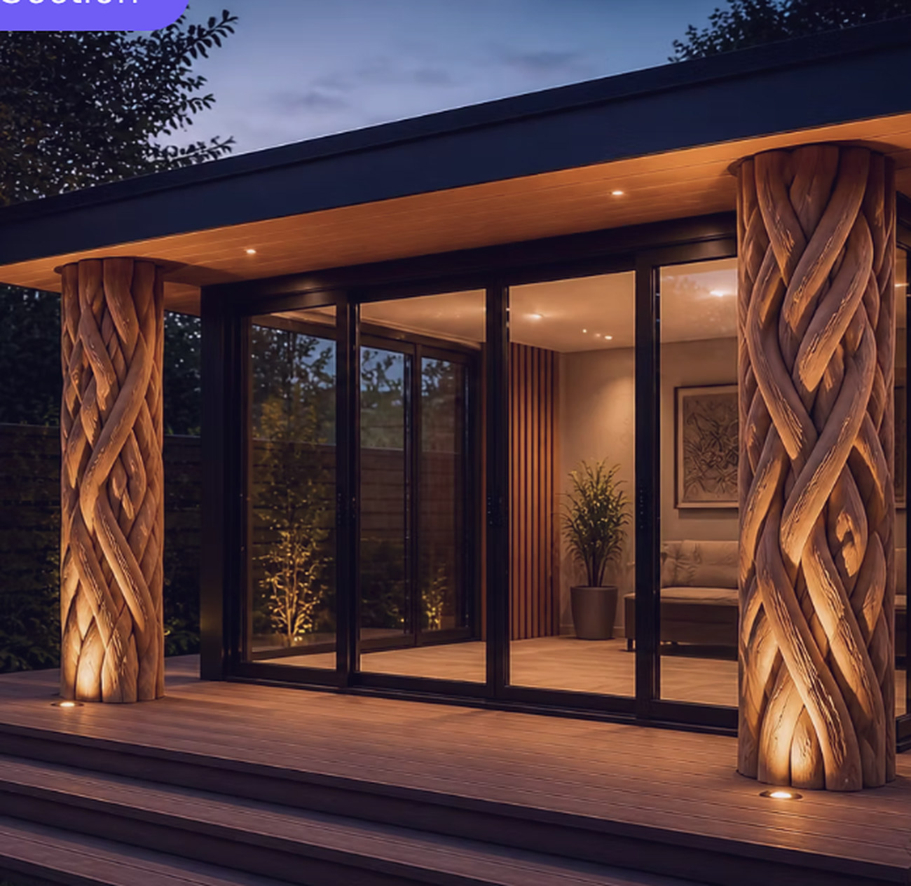 Garden studio entrance framed by two hand-carved twisting timber columns lit from below